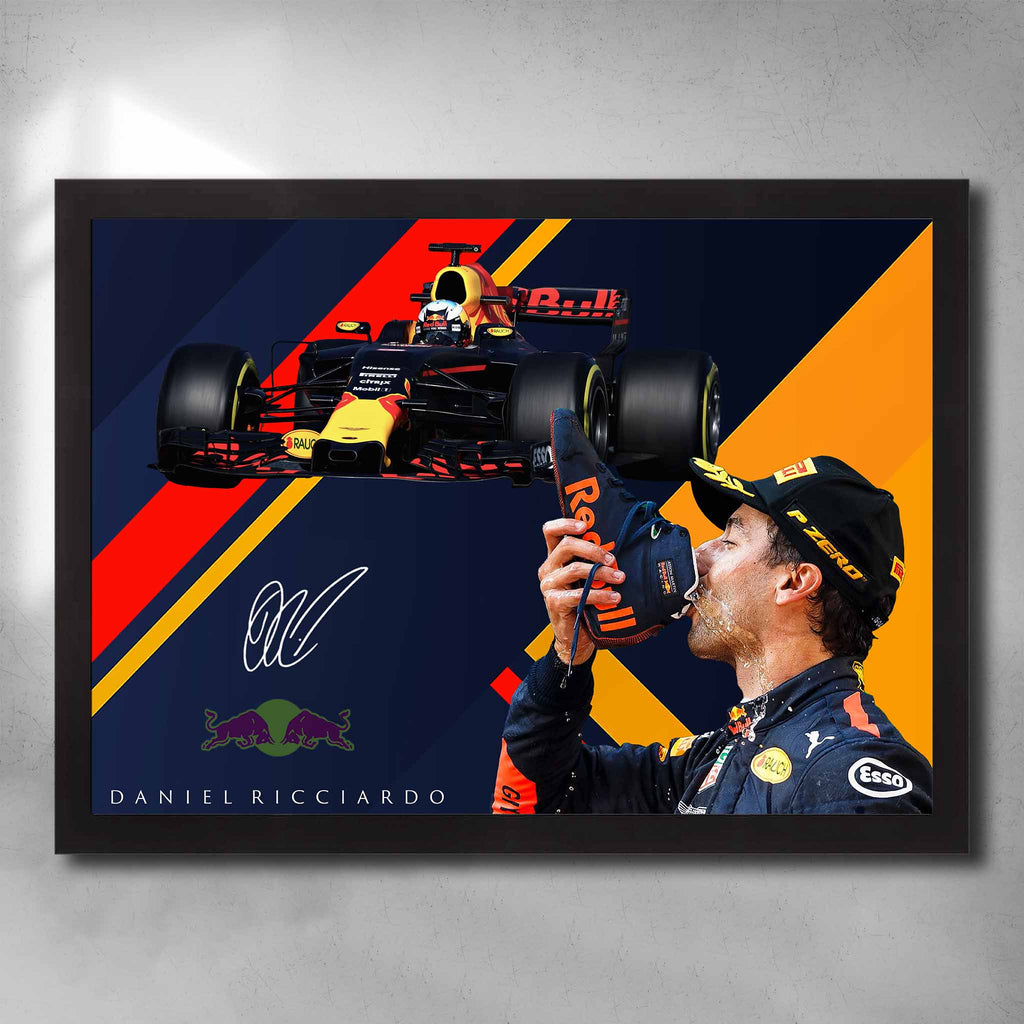 Black framed signed formula one art featuring Daniel Ricciardo driving for Redbull doing his signature shoey after a victory - by Sports Cave.