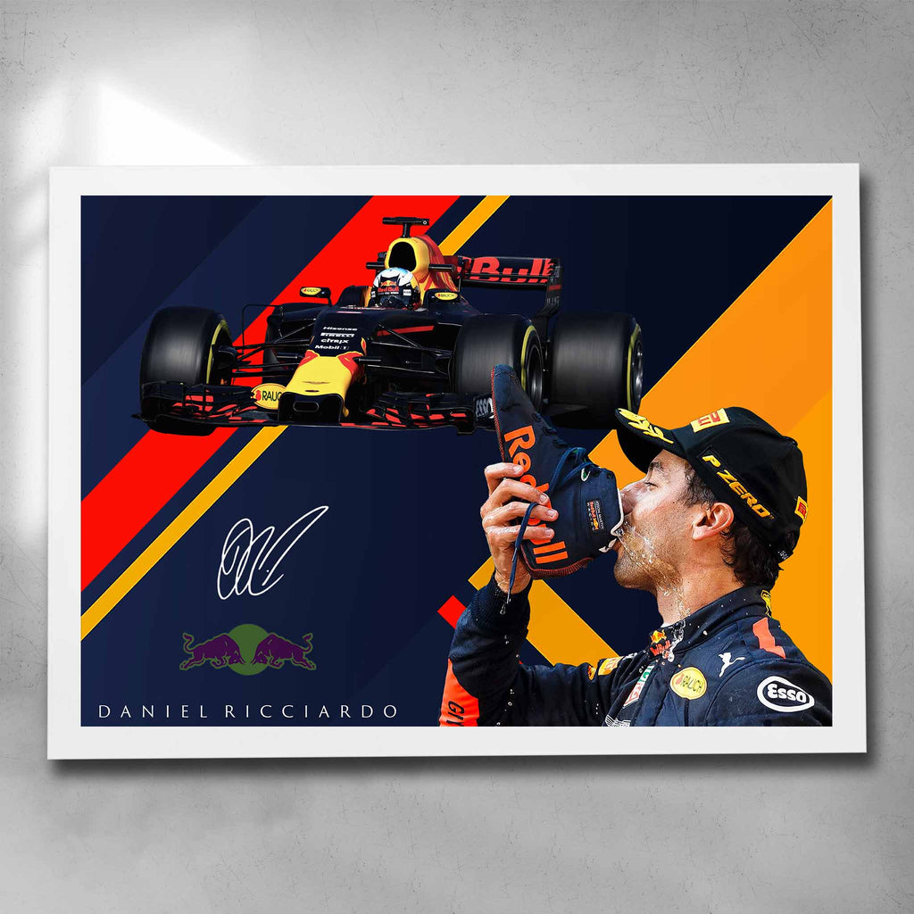 Elegant white framed signed formula one art featuring Daniel Ricciardo driving for Redbull doing his signature shoey after a victory - by Sports Cave.