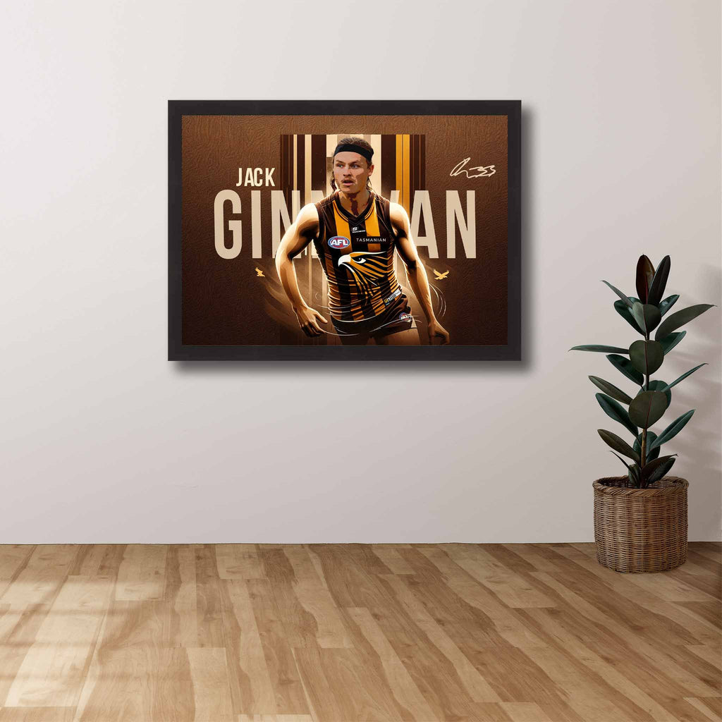 Hawthorn Hawks fan with a Black framed print of Jack Ginnivan on display.