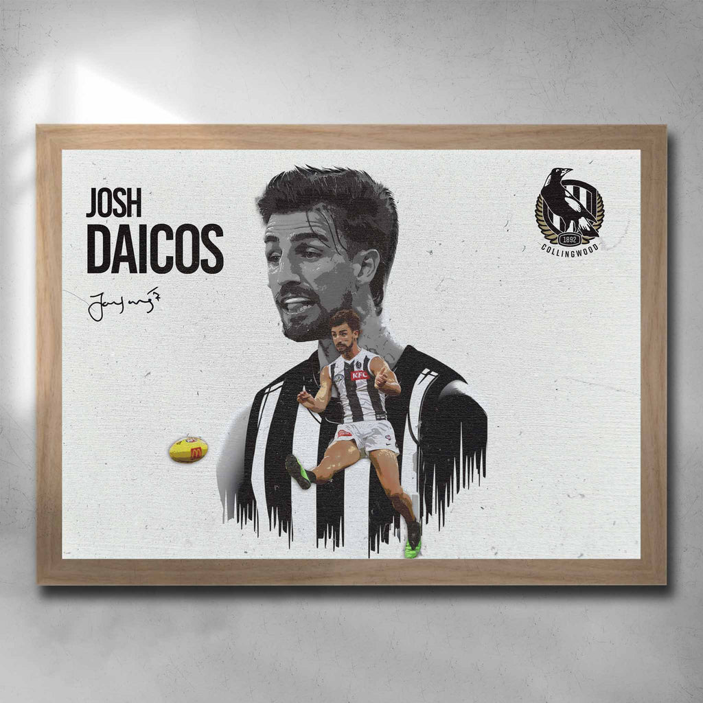 Oak framed AFL Poster by Sports Cave, featuring Josh Daicos from the Collingwood Magpies.