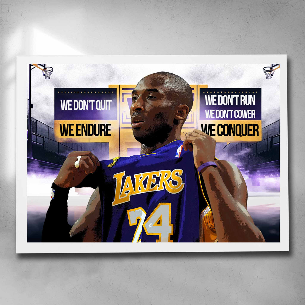 White framed motivational art by Sports Cave, featuring Kobe Bryant with his battle cry "we don't quit, we don't cower, we don't run, we endure and conquer.