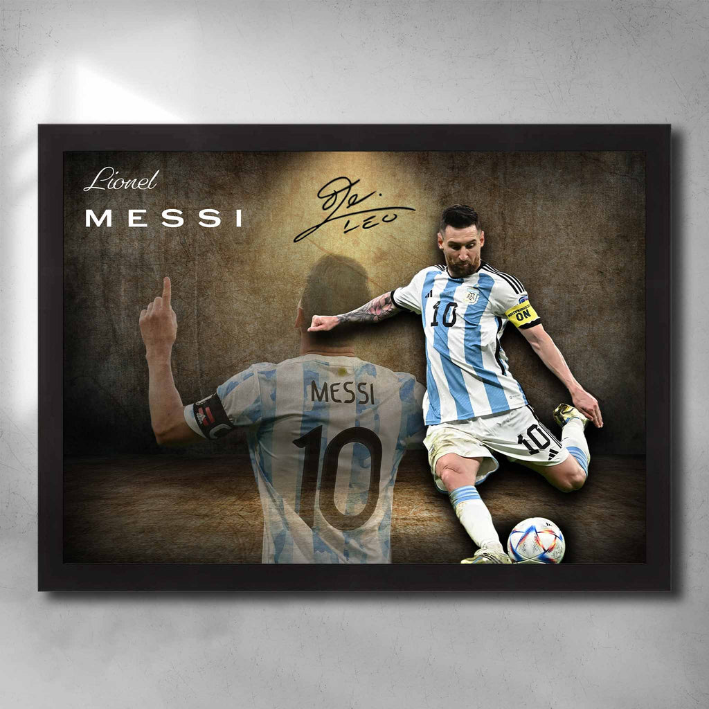 Black framed soccer art featuring a signed Lionel Messi print in the Argentina world cup game by Sports Cave.