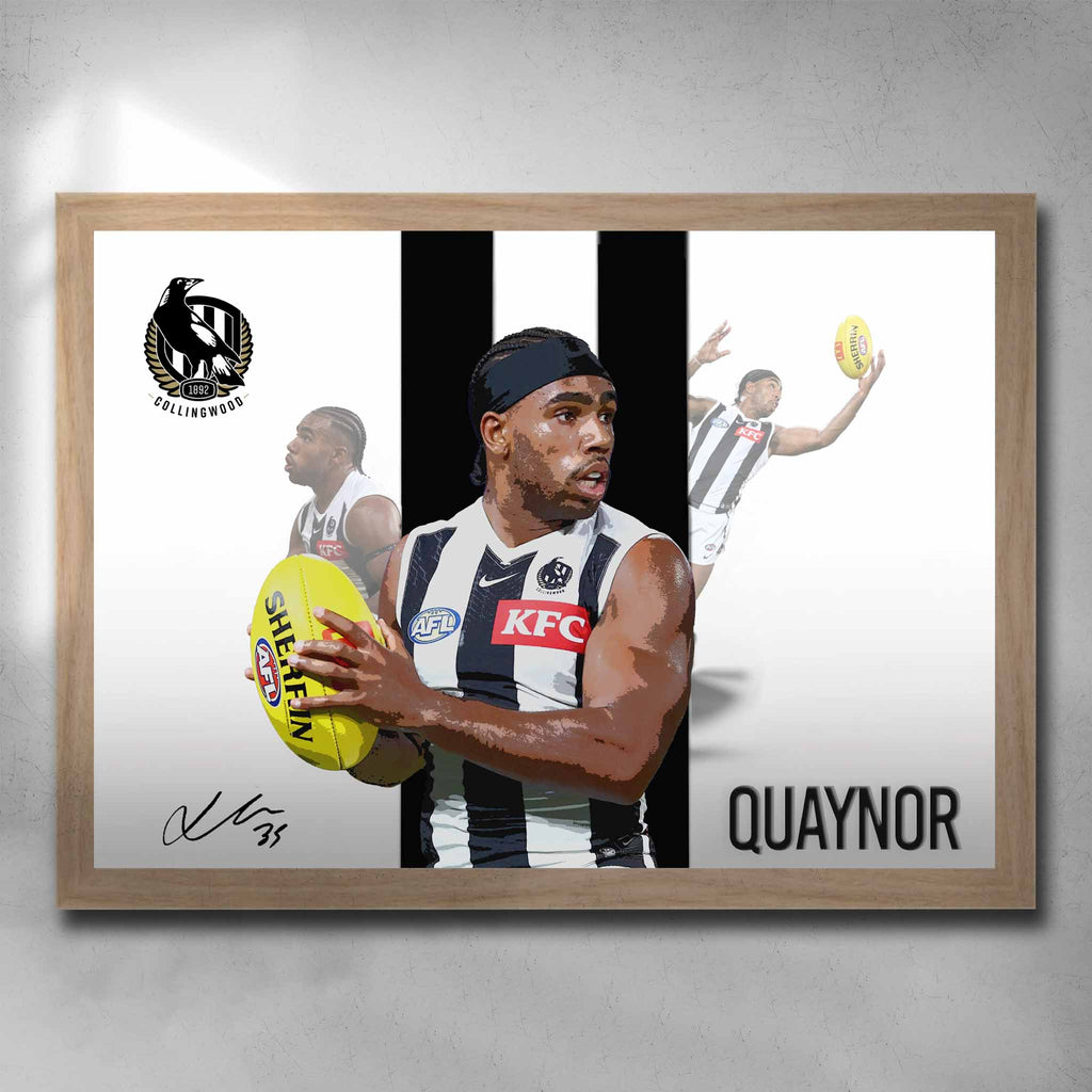 Oak framed AFL Poster by Sports Cave, featuring Isaac Quaynor from the Collingwood Magpies.