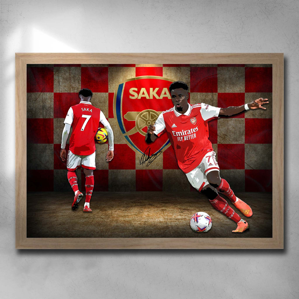 Oak framed soccer art by Sports Cave, featuring Bukayo Saka from Arsenal Football Club.