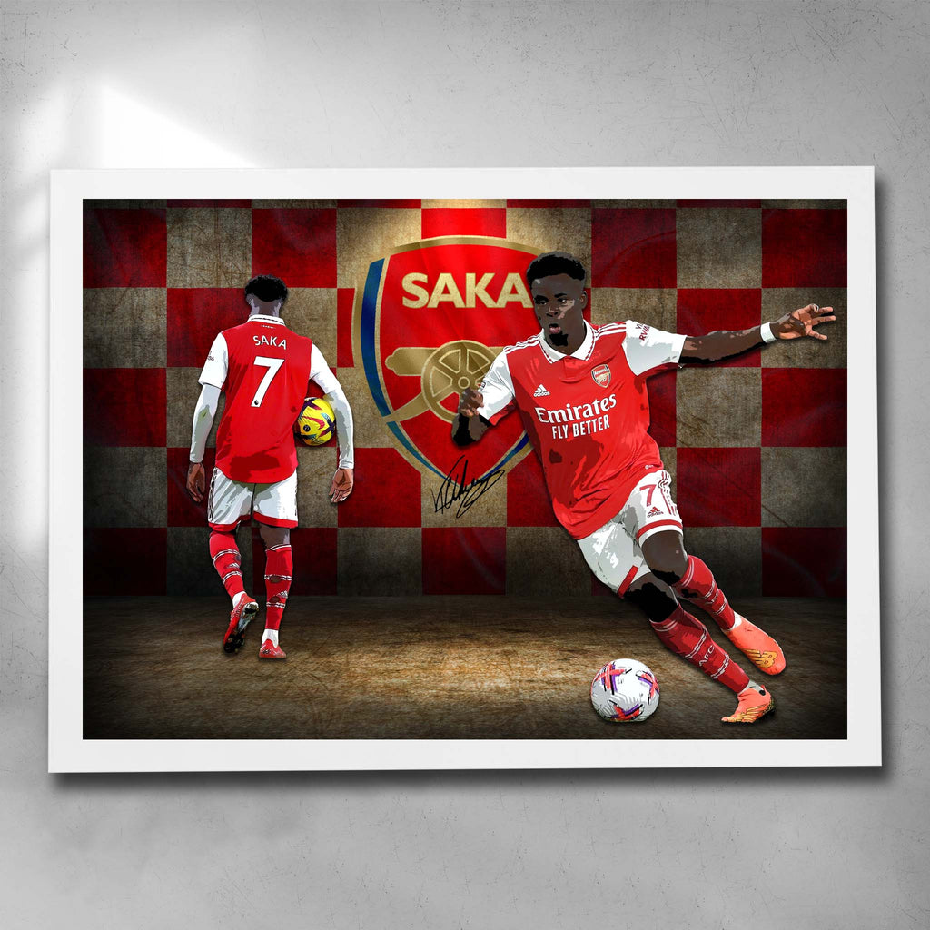 White framed soccer art by Sports Cave, featuring Bukayo Saka from Arsenal Football Club.